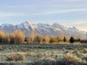 Enjoy big views of the entire Teton Range from this premium for sale in Jackson Wyoming Teton County County on GolfHomes.com