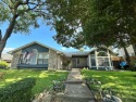Amazing escape!  This gorgeous home is located in a large pocket for sale in Garland Texas Dallas County County on GolfHomes.com