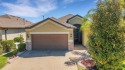 Located in the desired 55+ RESORT STYLE community of Del Webb for sale in Davenport Florida Polk County County on GolfHomes.com