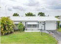 Carefree Living at Leisureville, Centrally Located In Pompano for sale in Pompano Beach Florida Broward County County on GolfHomes.com