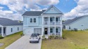 Welcome to this stunning 5-bedroom, 3.5-bathroom home in the for sale in Myrtle Beach South Carolina Horry County County on GolfHomes.com