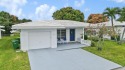Ready for immediate move in! NEW 2022 concrete tile roof for sale in Tamarac Florida Broward County County on GolfHomes.com