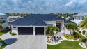 Waterfront living, warm coastal breezes, and effortless for sale in Punta Gorda Florida Charlotte County County on GolfHomes.com