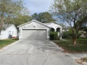 Welcome to this beautiful 4-bedroom, 2-bathroom home located in for sale in Odessa Florida Hillsborough County County on GolfHomes.com