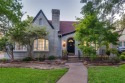 Fall in love with this enchanting single-story Tudor nestled in for sale in Dallas Texas Dallas County County on GolfHomes.com