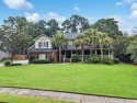 Welcome to this beautifully updated brick home that blends for sale in Summerville South Carolina Dorchester County County on GolfHomes.com