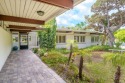 Privacy and tranquility define this single-level post-and-beam for sale in Pasadena California Los Angeles County County on GolfHomes.com
