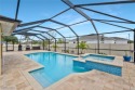 Tropical Pool & Spa Home that feels Like a Vacation Every Day! for sale in Cape Coral Florida Lee County County on GolfHomes.com