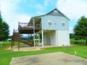 Perfect Getaway!  Custom built river home.  2 bedrooms, bath on for sale in Decaturville Tennessee Decatur County County on GolfHomes.com