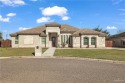 Welcome to 1602 Tierra Encantada, a charming residence in Tierra for sale in Weslaco Texas Hidalgo County County on GolfHomes.com