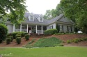 This amazing Home at Royal Lakes Golf & Country Club is a for sale in Flowery Branch Georgia Hall County County on GolfHomes.com