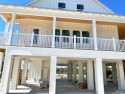 EACH LOT HAS ITS OWN DEEDED DEEP WATER BOAT SLIP.  The NOLACOLA for sale in Perdido Key Florida Escambia County County on GolfHomes.com