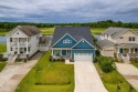 This beautiful 3-bedroom, 2.5-bath custom-built home with two for sale in Beaufort North Carolina Carteret County County on GolfHomes.com