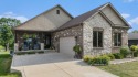 Charming LAKEFRONT RANCH WITH WALKOUT BASEMENT WITH OVER 3300 for sale in Crown Point Indiana Porter County County on GolfHomes.com