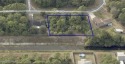 48 acre (double lot). NEW PAVED road, the drainage canal in back for sale in Palm Bay Florida Brevard County County on GolfHomes.com