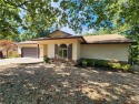 Welcome to this inviting Bella Vista corner-lot home designed for sale in Bella Vista Arkansas Benton County County on GolfHomes.com