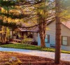 Tucked away in the trees on two beautifully wooded lots at Lake, Ohio