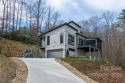 Newly constructed light-filled mountain modern home with amazing for sale in Etowah North Carolina Henderson County County on GolfHomes.com