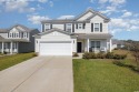 Discover this stunning 4-bedroom, 2.5-bath corner lot home with for sale in Myrtle Beach South Carolina Horry County County on GolfHomes.com