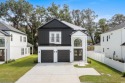 Welcome to this luxurious 4-bedroom, 3.5-bath beach home! for sale in Myrtle Beach South Carolina Horry County County on GolfHomes.com