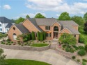 Welcome to this breathtaking brick estate, perfectly positioned for sale in Canton Ohio Stark County County on GolfHomes.com