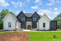 Welcome to 205 Eagles Way, a stunning new construction home for sale in Eatonton Georgia Putnam County County on GolfHomes.com