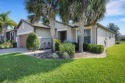 Located in the desired 55+ RESORT STYLE community of Del Webb for sale in Davenport Florida Polk County County on GolfHomes.com