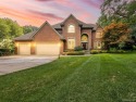 This stunning brick colonial home is nestled on a spacious and for sale in Farmington Hills Michigan Oakland County County on GolfHomes.com