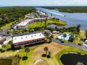SPECTACULAR RIVERFRONT CONDO VILLA WITH BEACH, WATERWAY, POOL for sale in Flagler Beach Florida Flagler County County on GolfHomes.com