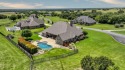 GORGEOUS Golf Course Home situated on over an acre in the for sale in Weatherford Texas Parker County County on GolfHomes.com