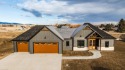 This stunning NEW craftsman-style 4-bedroom, 2.5 bath home in for sale in Sheridan Wyoming Sheridan County County on GolfHomes.com