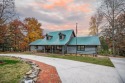 This spectacular 4,776 sf Honest Abe-built log home, standing for sale in Livingston Tennessee Overton County County on GolfHomes.com