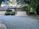 Truly a rare find best location ever (exit 7) nested away in a for sale in Johns Creek Georgia Fulton County County on GolfHomes.com