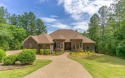 Stunning all-brick and stone lakefront home on Lake Granada in for sale in Hot Springs Village Arkansas Saline County County on GolfHomes.com