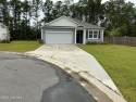Like-New Coastal Retreat 
Step into coastal comfort with this for sale in Bolivia North Carolina Brunswick County County on GolfHomes.com