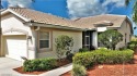 This updated twin villa with a golf course and sunset view is for sale in Lehigh Acres Florida Lee County County on GolfHomes.com