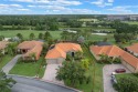 Nestled in the heart of the award-winning Solivita 55+ community for sale in Kissimmee Florida Polk County County on GolfHomes.com