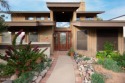 Welcome to your dream home with a stunning backyard oasis for sale in Mesa Arizona Maricopa County County on GolfHomes.com