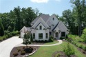 This exceptional golf course home is located in The Manor Golf for sale in Milton Georgia Fulton County County on GolfHomes.com