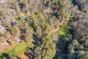 Discover the perfect setting for your dream home on this for sale in Hendersonville North Carolina Henderson County County on GolfHomes.com