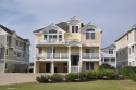 This stunning semi-oceanfront residence boasts an expansive for sale in Nags Head North Carolina Dare County County on GolfHomes.com