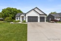 You'll fall in love with this custom built home by Rost Homes, a for sale in Hudsonville Michigan Ottawa County County on GolfHomes.com