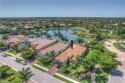 Elegant LAKEFRONT POOL Home on a PRIVATE corner lot in Oyster for sale in Naples Florida Collier County County on GolfHomes.com