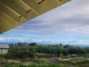 TINY HOUSE ON 20,000 SF LEVEL LOT, OCEAN VIEWS, NEAR GOLF COURSE for sale in Naalehu Hawaii Big Island County County on GolfHomes.com