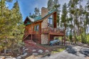 This classic Columbine Lake mountain home is a 4BR/ 4BA with for sale in Grand Lake Colorado Grand County County on GolfHomes.com