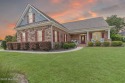 This exceptional residence, located within the esteemed Compass for sale in Leland North Carolina Brunswick County County on GolfHomes.com