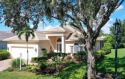 Welcome to your dream home in the award-winning University Park for sale in University PK Florida Manatee County County on GolfHomes.com