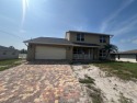 This spacious 2,100+ SqFt POOL home, offers 3 large bedrooms and for sale in Fort Myers Florida Lee County County on GolfHomes.com
