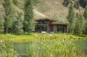 This stunning mountain modern home is situated on one of the for sale in Jackson Wyoming Teton County County on GolfHomes.com