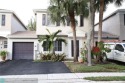 Welcome to this stunning 3-bedroom, 2.5-bathroom townhome for sale in Tamarac Florida Broward County County on GolfHomes.com